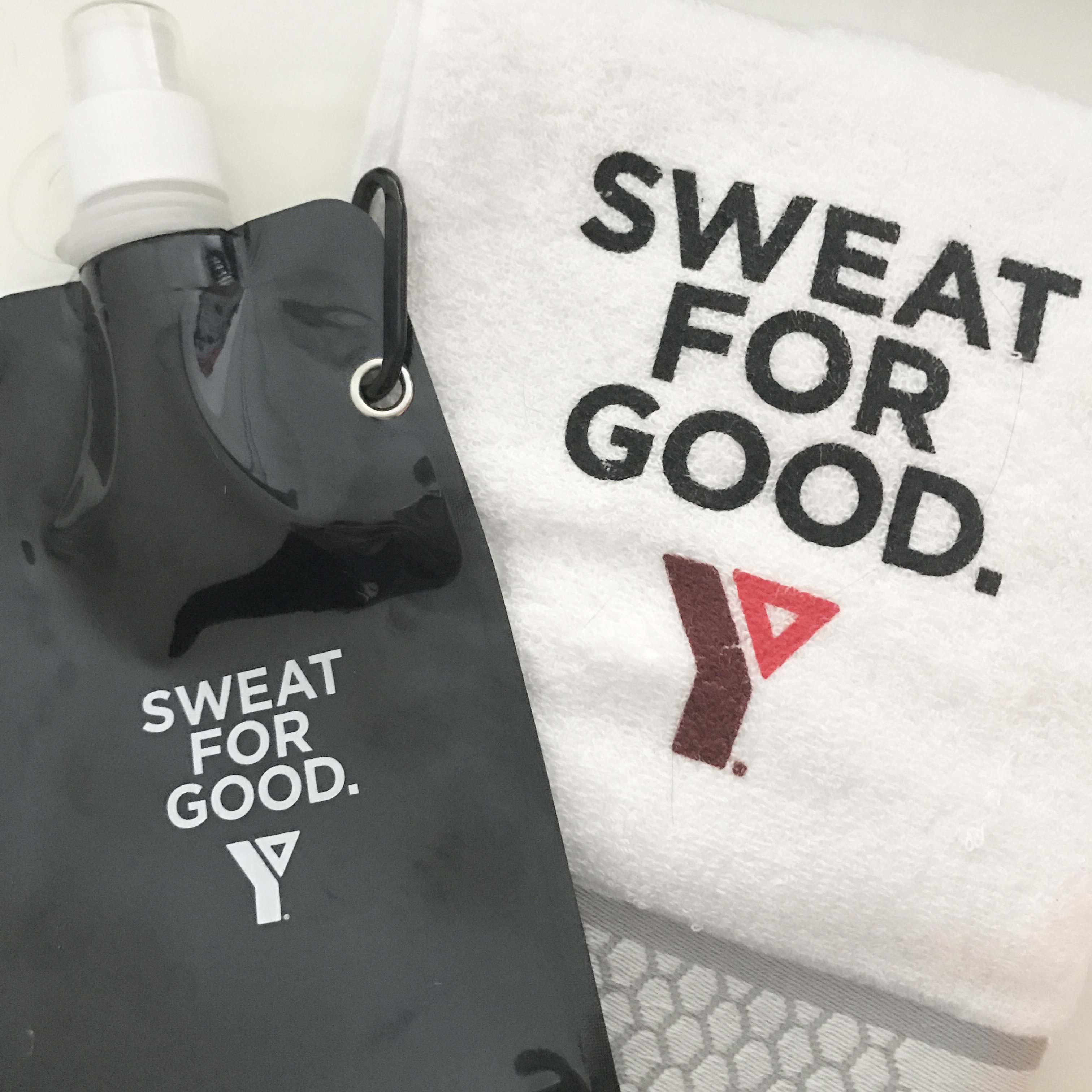 Sweat for Good towel and bottle